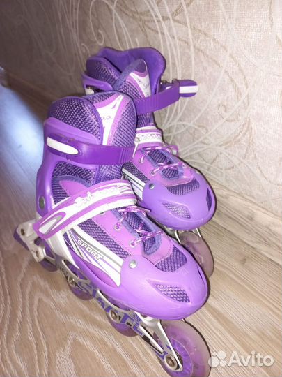 Роликовые коньки