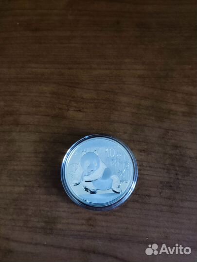 Серебряная монета Китай панда