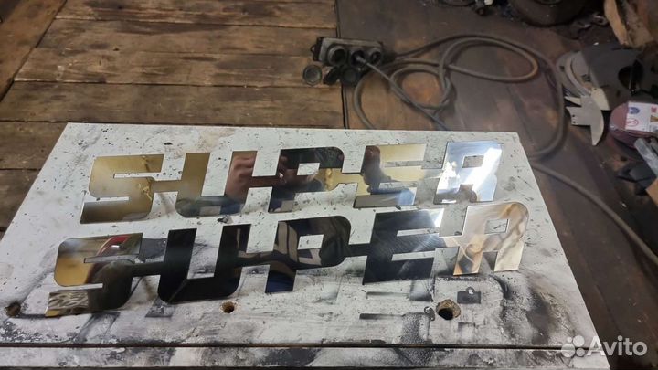 Эмблема super