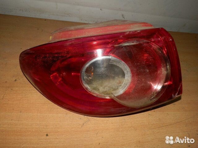 Фонарь левый на Mazda 2 DY до 2006