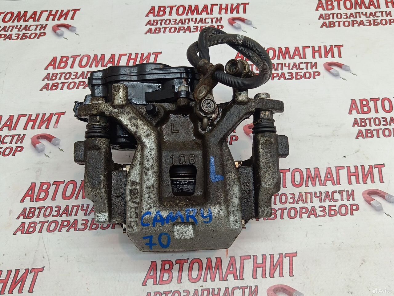 Супорт тормозной задний левый Toyota Camry 70