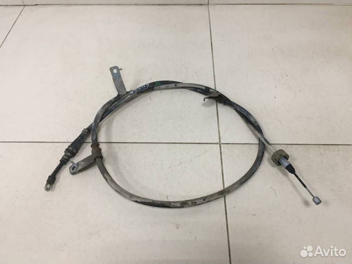Трос стояночного тормоза левый Kia Cerato YD 2013