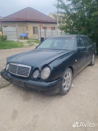 Mercedes е 210