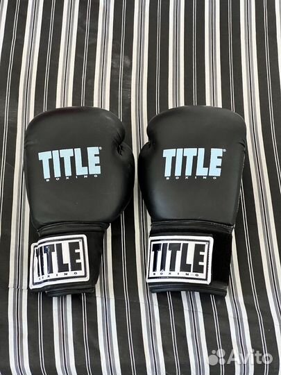 Боксерские перчатки title
