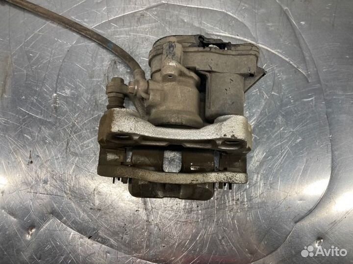 Суппорт тормозной задний Mazda CX-9 New