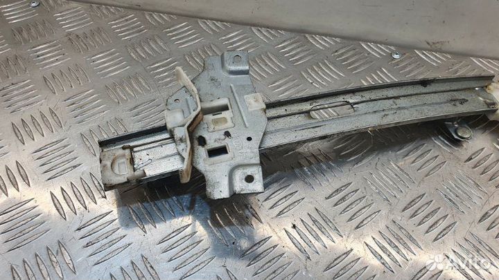 Стеклоподьемник задний правый Kia Spectra седан