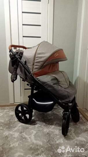 Прогулочная всесезонная коляска camarelo elix