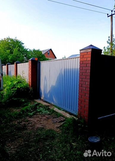 Откатные ворота с калиткой с автоматикой