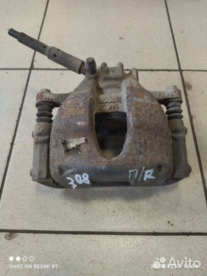 Суппорт тормозной передний правый Peugeot 308