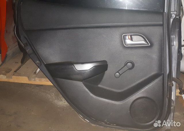 Обивка двери задняя левая Kia Rio QB G4FA 2011