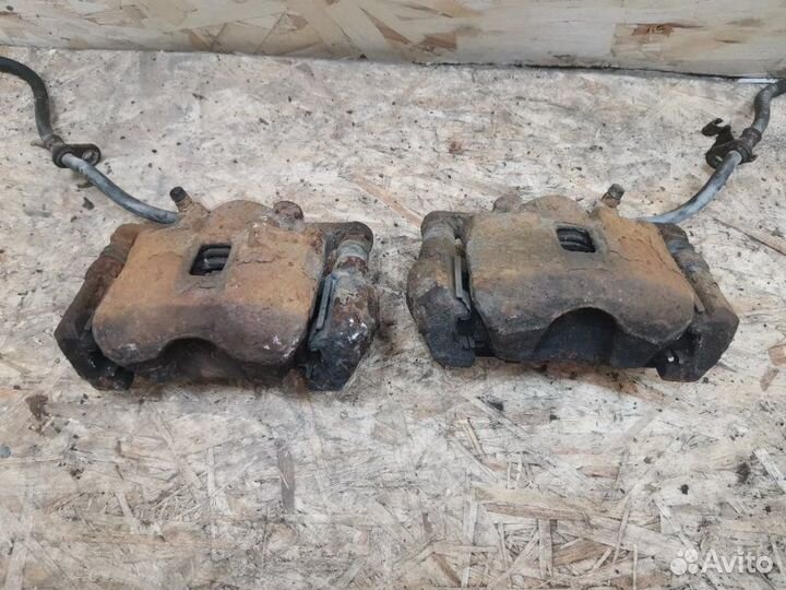 Суппорт тормозной передний Suzuki Liana 1.6 M16A