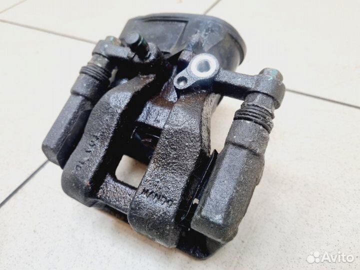 Суппорт задний левый Geely Atlas 2.4 4G24 AT 2020