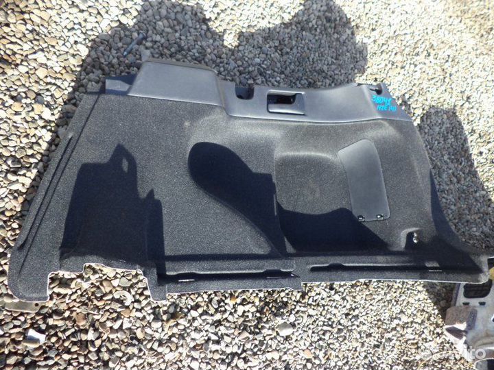 Обшивка багажника правая Toyota Corolla Fielder