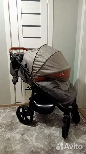 Прогулочная всесезонная коляска camarelo elix