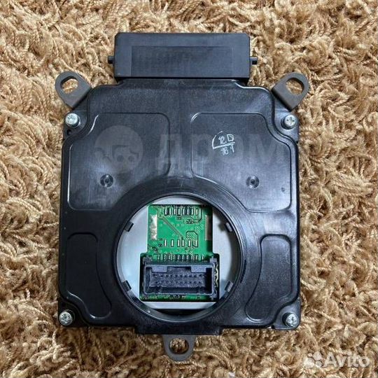 Блок управления фарами передний левый Toyota