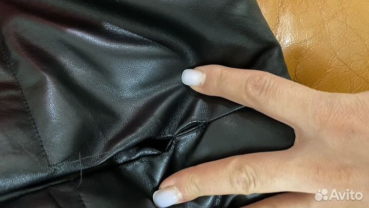 Кожаная жилетка