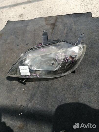 Фара левая Mazda Demio DY3W