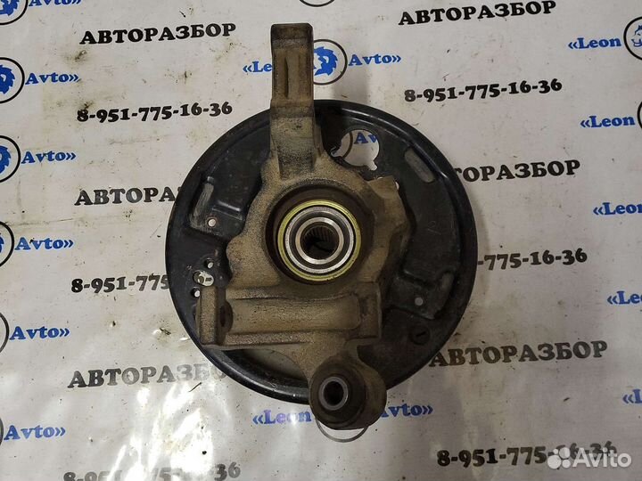 Кулак поворотный задний левый Nissan sunny 4wd