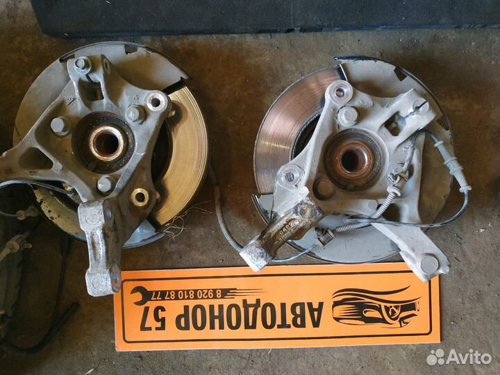 Поворотный кулак Opel Astra J. 2013 год