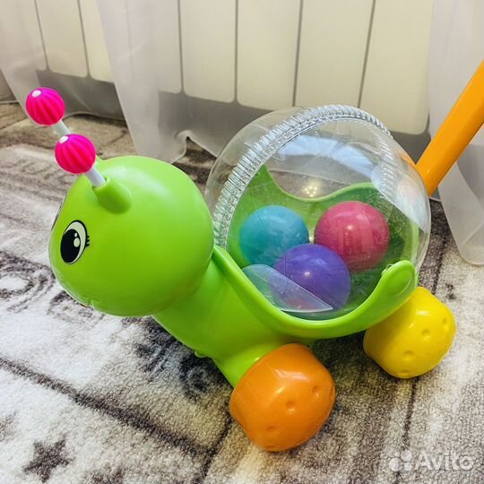 Игрушка каталка с ручкой Улитка
