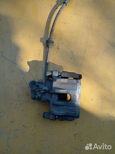 Супорт правый задний Ford Focus 2