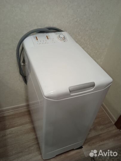 Стиральная машина с вертикальной загрузкой