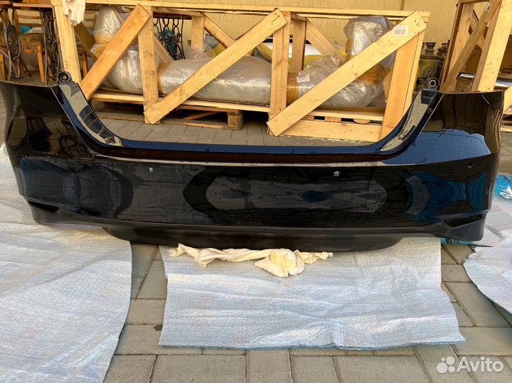 Бампер задний без губы Toyota Camry V75