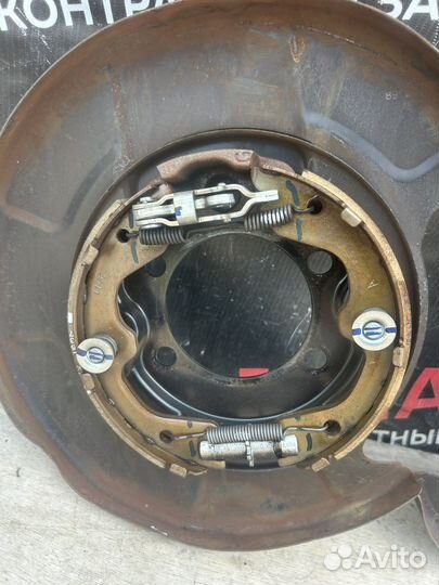 Механизм стояночного тормоза Ниссан Тиана 32