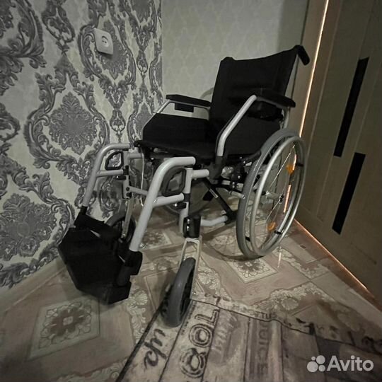 Инвалидная коляска