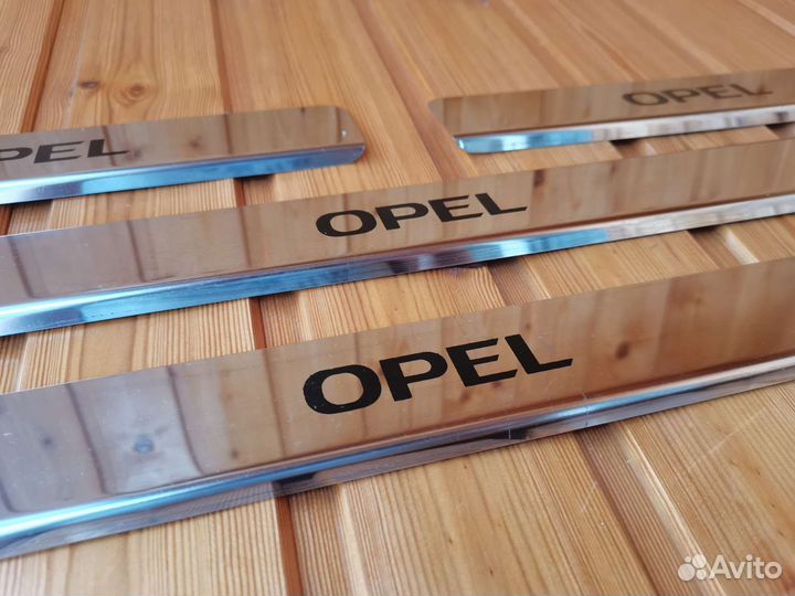 Накладки на пороги opel астра j новые