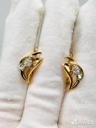 Золотые серьги с камнем