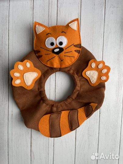 Игрушка на объектив фотоаппарата