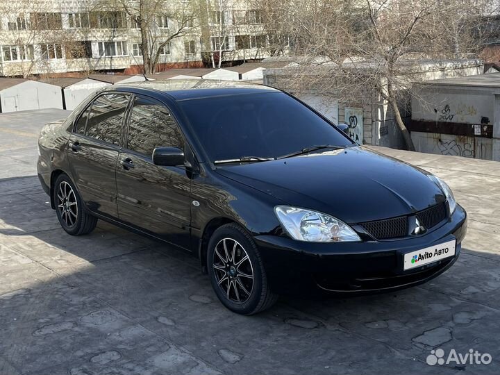 Mitsubishi Lancer 1.6 МТ, 2005, 311 000 км