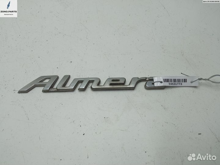 Эмблема на Nissan Almera Tino