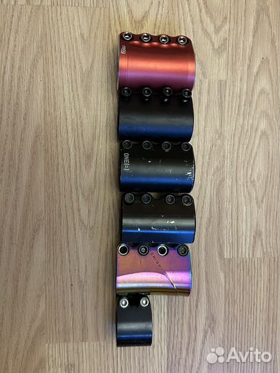 Зажим для трюкового самоката