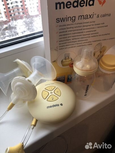 Молокоотсос medela swing maxi