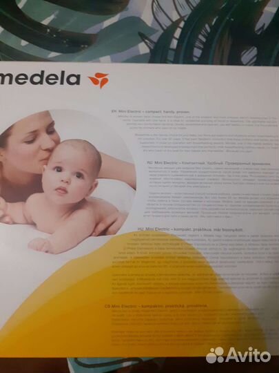 Молокоотсос medela электрический