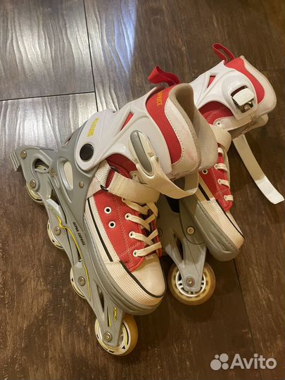 Роликовые коньки