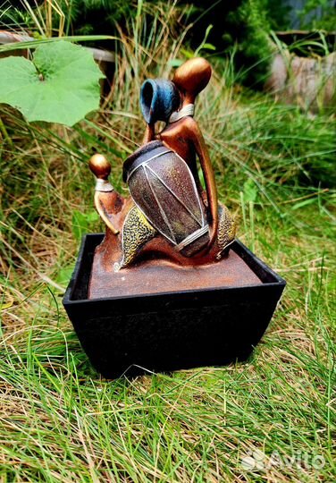 Домашний фонтан Африканки