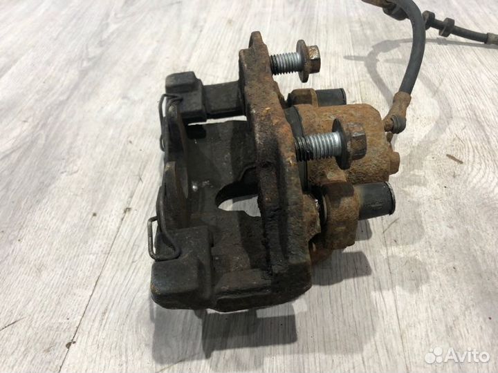 Суппорт тормозной передний левый Ford Focus 3 pnda