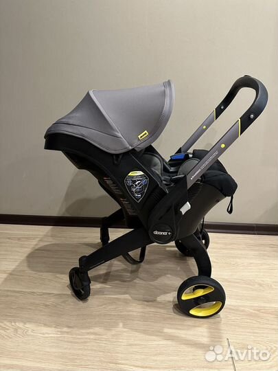 Коляска автокресло doona с базой isofix как новая