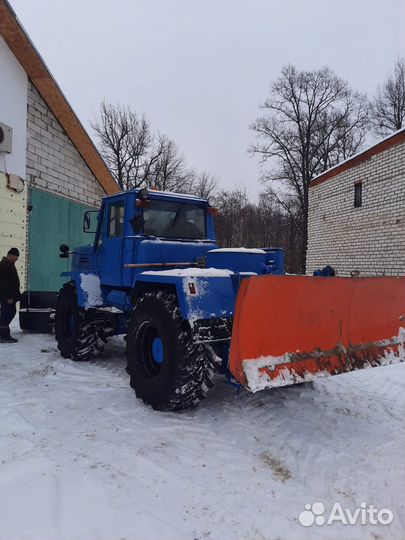 Чистка снега трактором