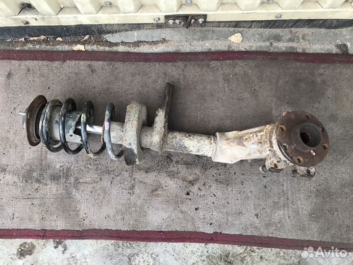 Стойка амортизатор левая Daewoo Nexia