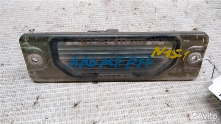 Фонарь подсветки номера Nissan Almera N15 95-00г
