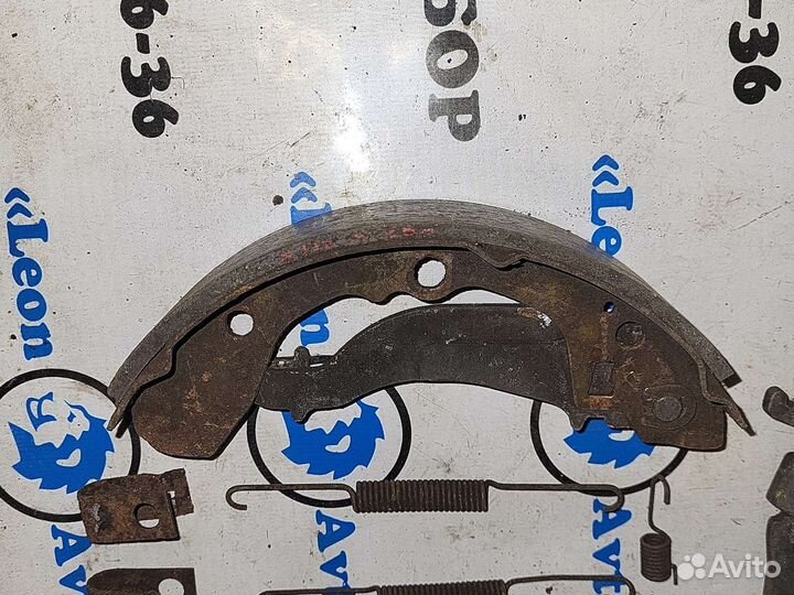 Тормозной механизм ручника правый KIA sephia