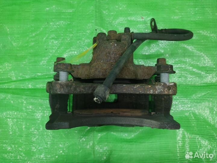 Суппорт передний правый Sportage / Tucson 04-10