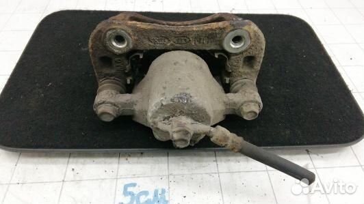 Суппорт тормозной задний правый KIA carens 3 (93E2