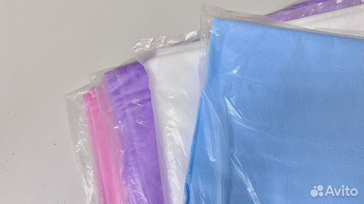 Одноразовые простыни в сложении