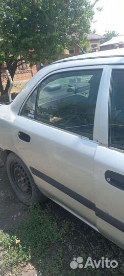 Двери mitsubishi carisma