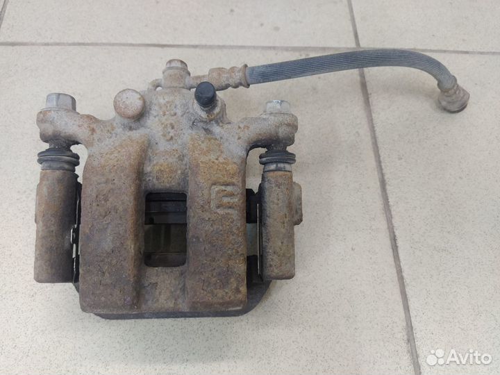 Тормозной суппорт задний правый Ниссан Кашкай J10